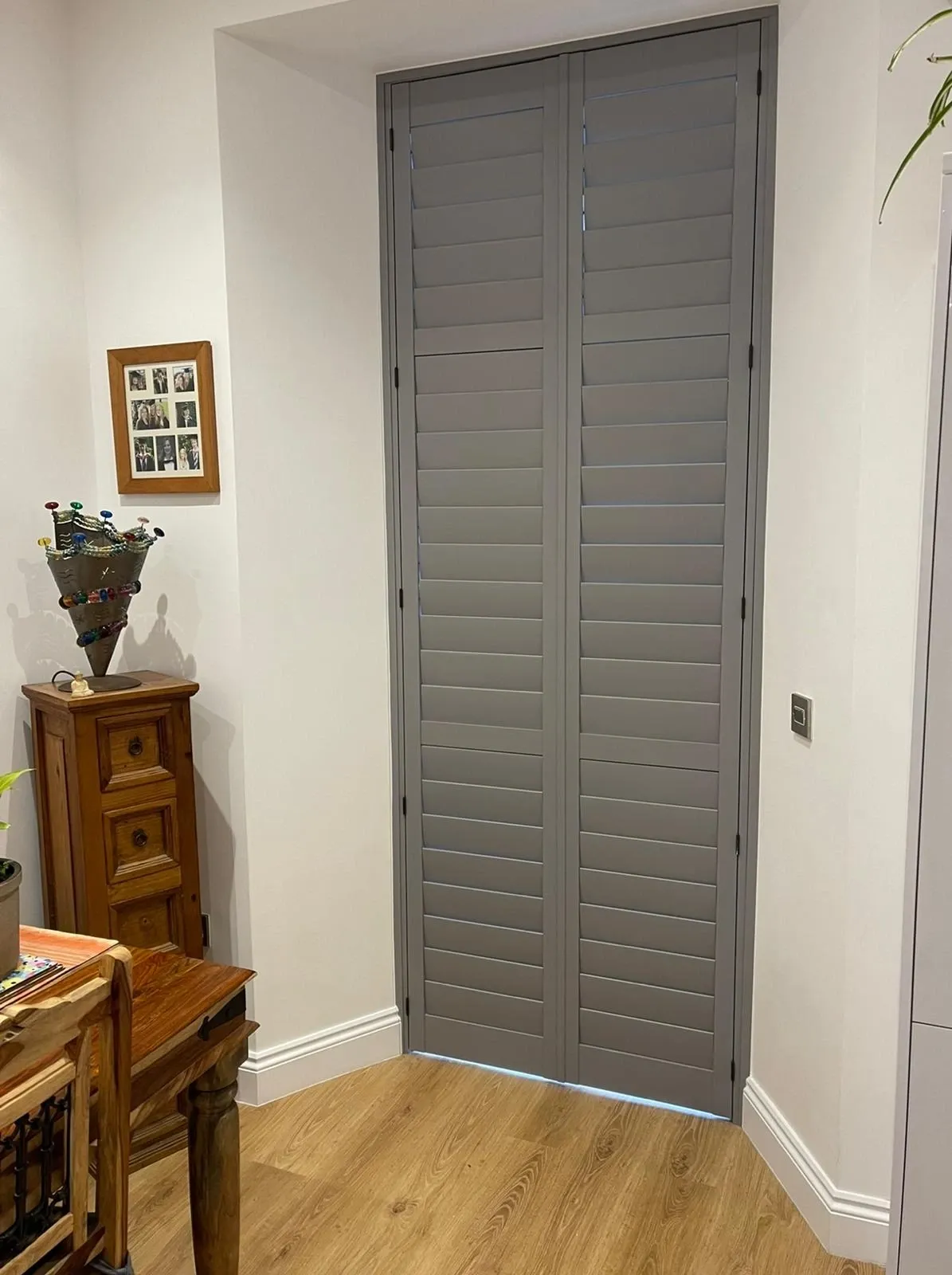 Full height plantation shutters in a kitchen